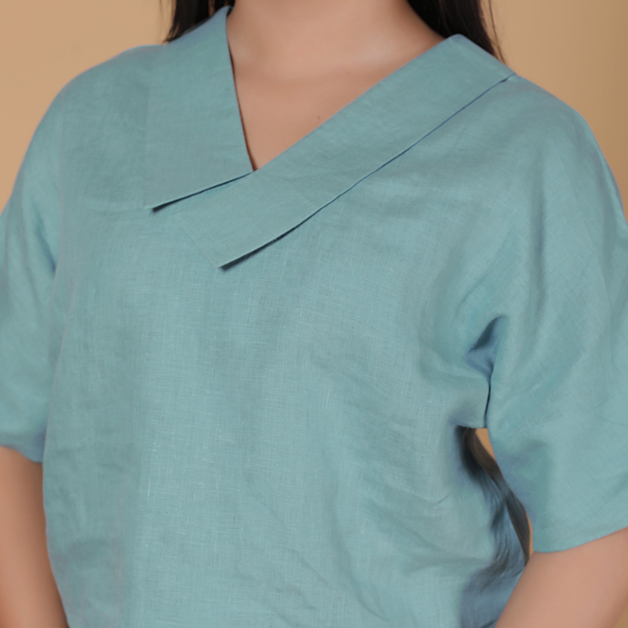 POLISHED V-NECK TOP