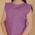 SLEEVLESS PLEATED TOP