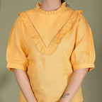 VINTAGE CHARM LINEN TOP WITH RUFFLE YOKE