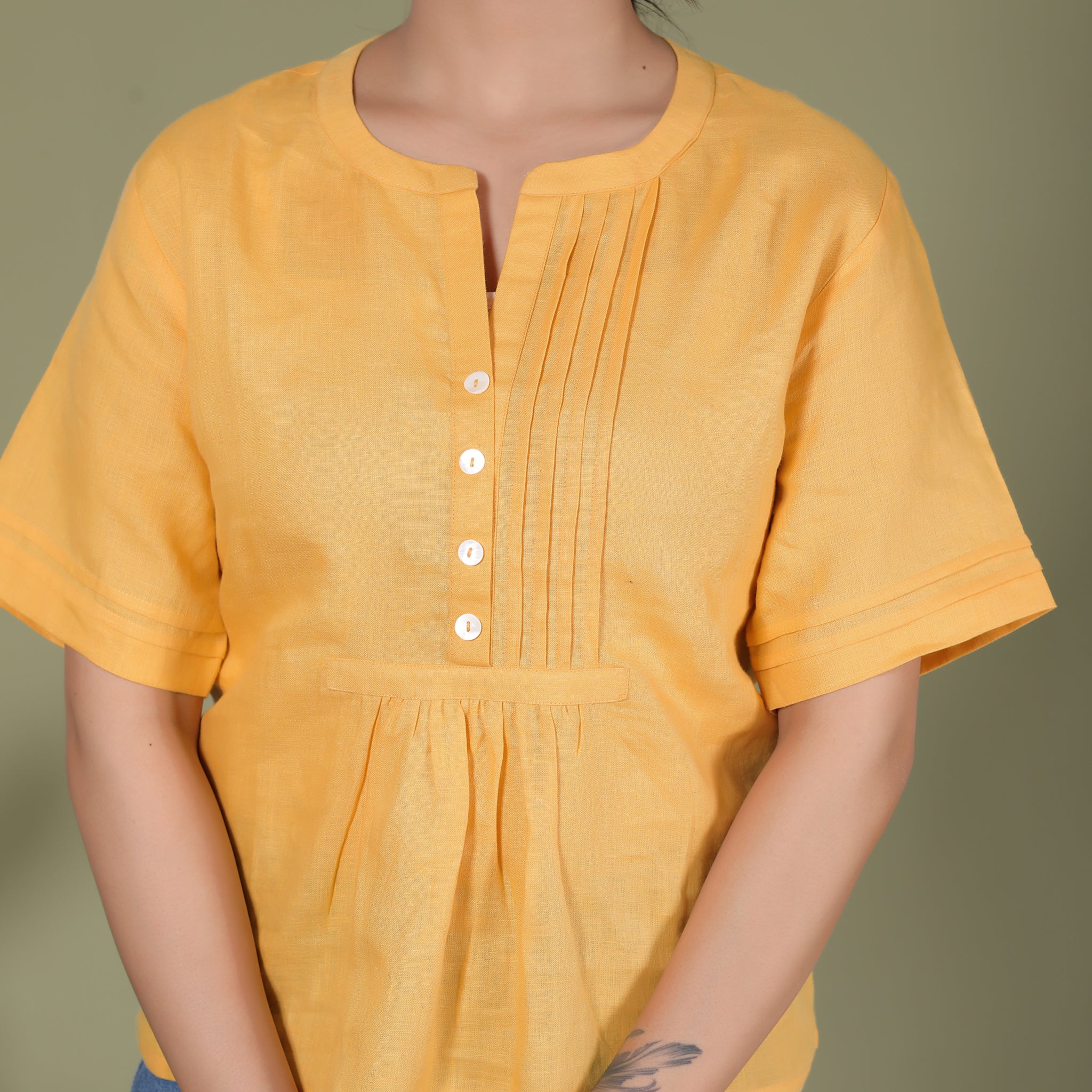 PLEATED YOKE TOP