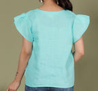 ASYMMETRICAL BUTTON TOP