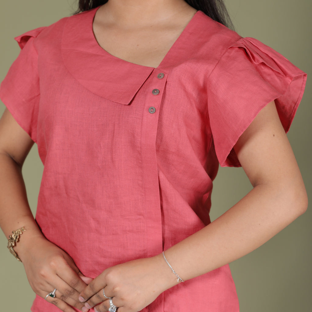 ASYMMETRICAL BUTTON TOP